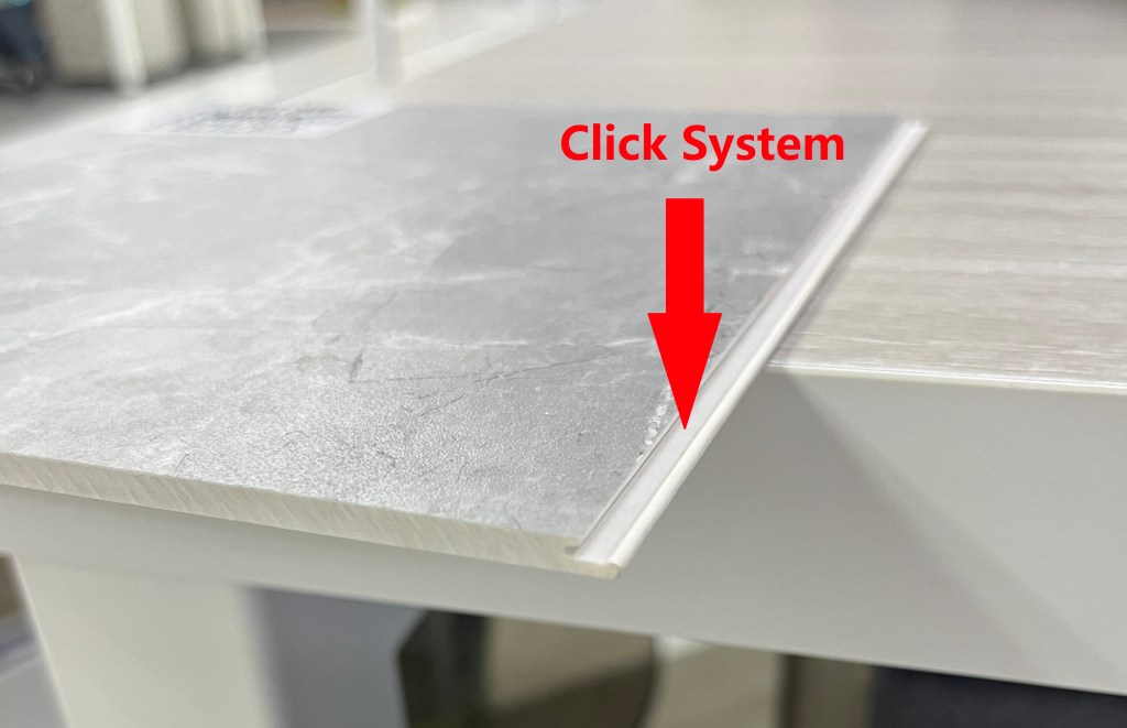 Close-up view of SPC wall panel click system for easy installation