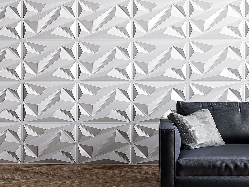 SPC wall panel with CNC carving surface treatment showing three dimensional reliefs and patterns used in high end spaces with strong decorative requirements delivering complex artistic visual effects though the surface is not completely flat