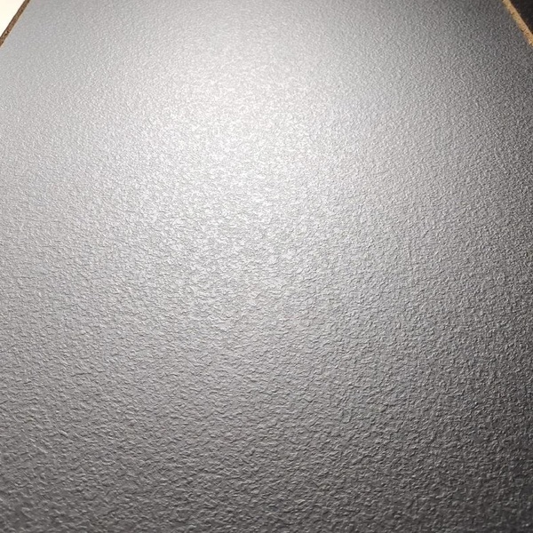 SPC wall panel with leather-like embossing texture, showing a high-end and luxurious decorative effect that adds unique style and quality to upscale wall designs